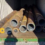 prime new seamless steel tubes in a container